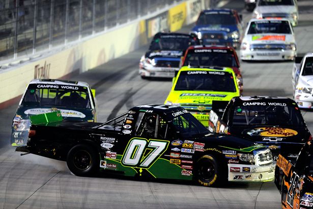 Donny Lia, driver of the No. 07 ASI Limited Toyota, spins out and collects Austin Dillon in the No. 3 Bass Pro Shops Chevrolet, to bring out the second caution from laps 21-26 in the NASCAR Camping World Truck Series O'Reilly 200 at Bristol Motor Speedway on Wednesday in Bristol, Tenn. Credit: John Harrelson/Getty Images for NASCAR
